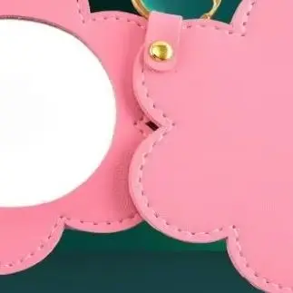 PU lederen bloemvorm make-upspiegel ronde ultradunne lichtgewicht cosmetische spiegels draagbare mini draaibare reiszakspiegel