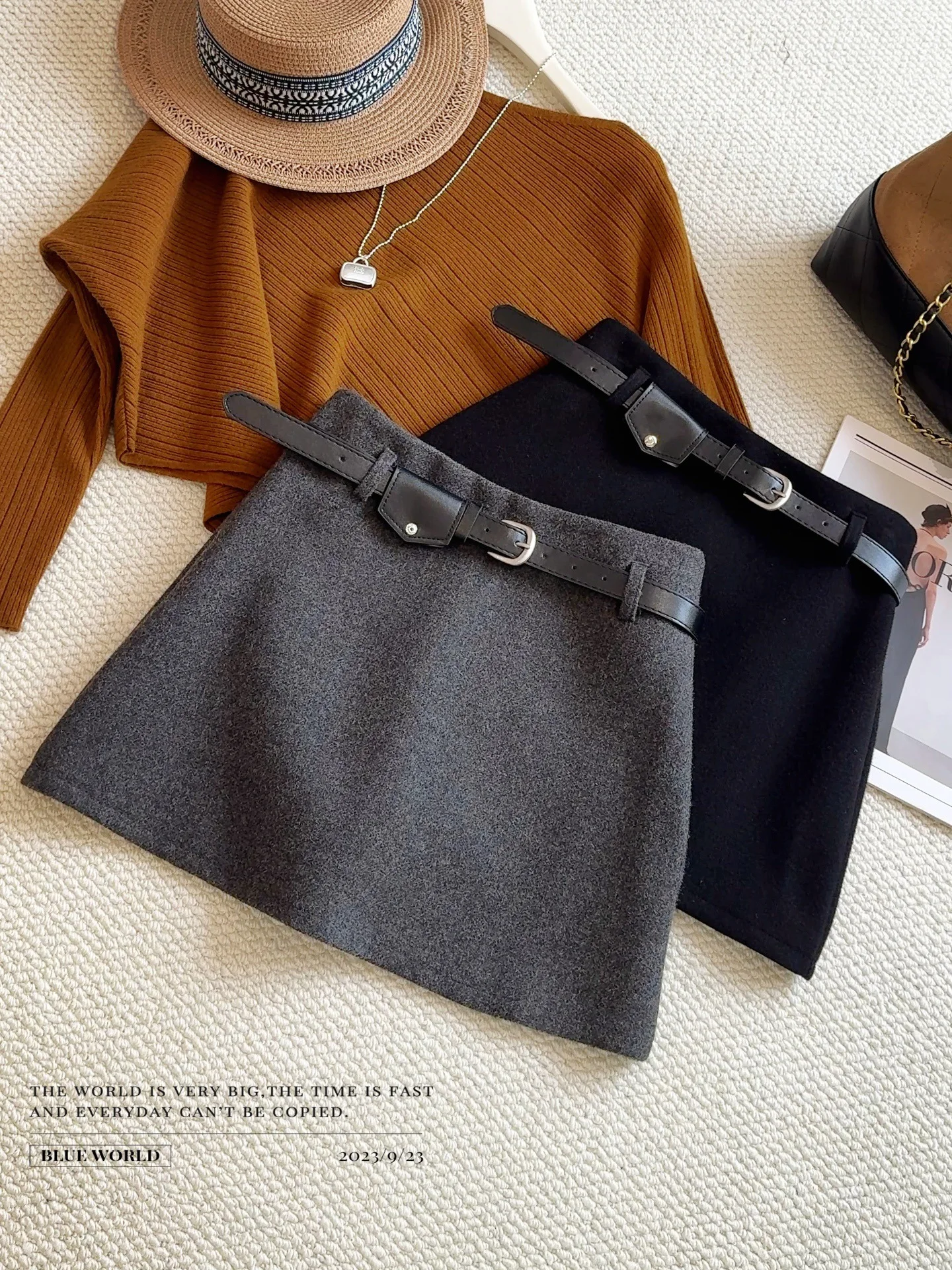 

Korean version woolen skirt for women in autumn and winter 2025, retro versatile, brushed, anti glare A-line suit short skirt