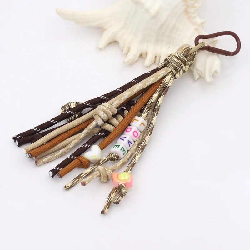 Modischer geflochtener Seil-Knoten-Schlüsselanhänger, trendiges Geschenk, DIY-Design, für Herren und Damen, Taschenanhänger, Quaste, Perle, Buchstabe, Liebes-Paar-Schlüsselanhänger – Detail 1