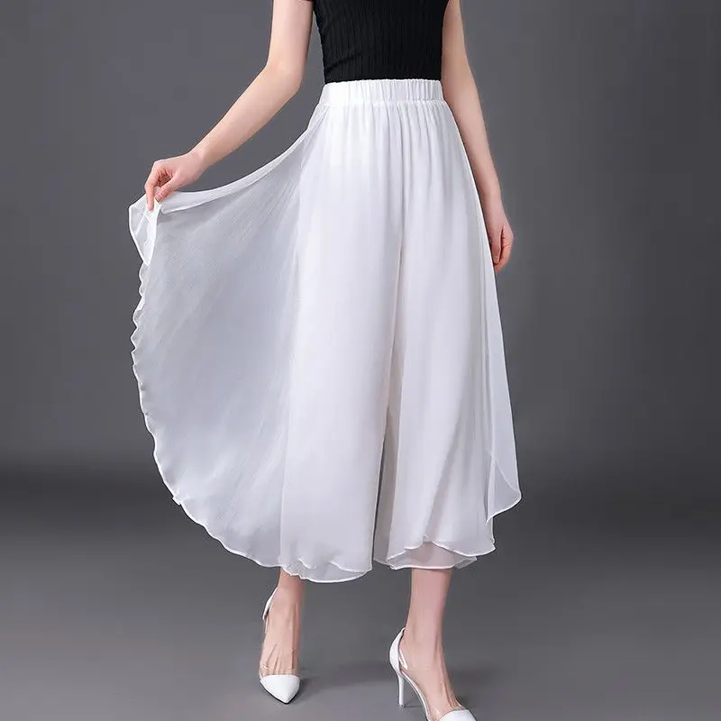 Pantalon Capri taille haute élastique pour femmes, vêtements d'été, ample, à la mode, couleur unie, épissé, en mousseline de soie, jambes larges, nouvelle collection 2025