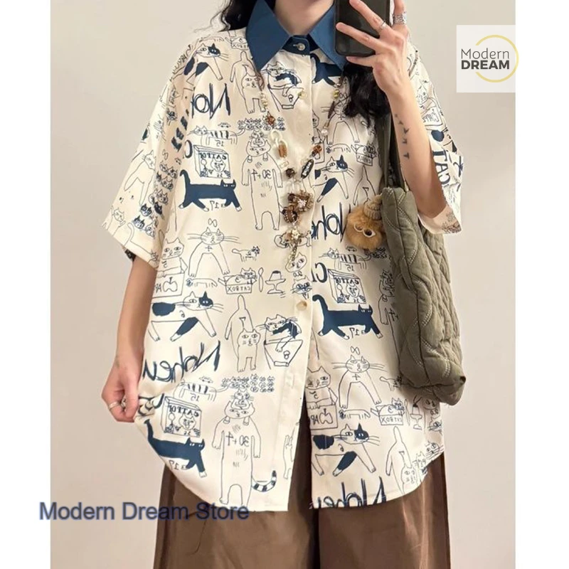 

French retro cartoon letter design sense niche printed short-sleeved shirts women's summer new fashion tops loose thin shirts.