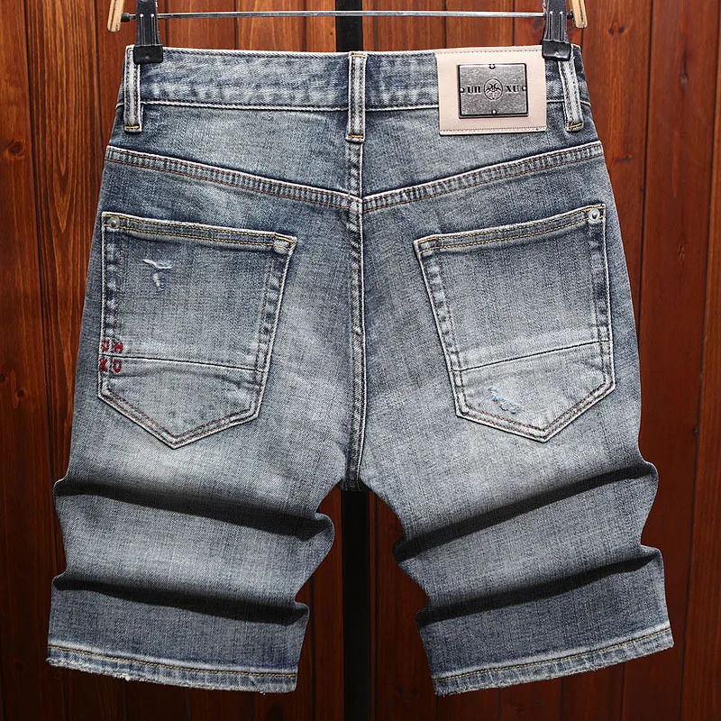 High end summer denim shorts for men with perforated patches, trendy fashion, casual, retro and nostalgic five quarter pants
