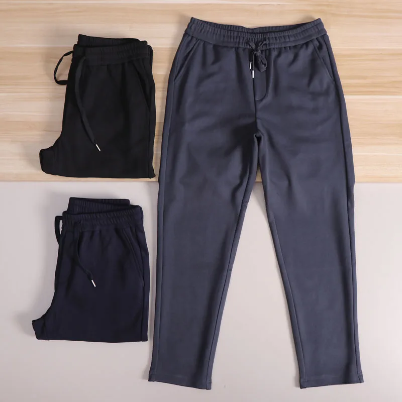 

Теплые удобные мужские повседневные брюки из смеси шелковой шерсти с эластичной резинкой на талии, прямые брюки для улицы, осень-зима, мягкие свободные длинные брюки...