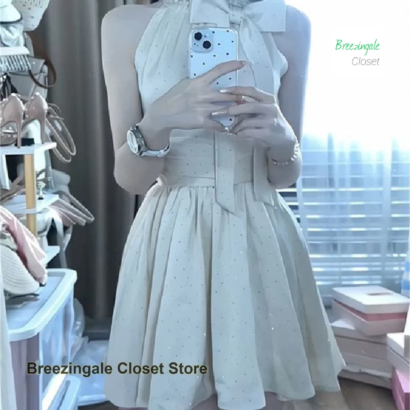 

French rhinestones bright flashing bow hanging neck sleeveless dress female summer new temperament sweet slim A-line skirt.