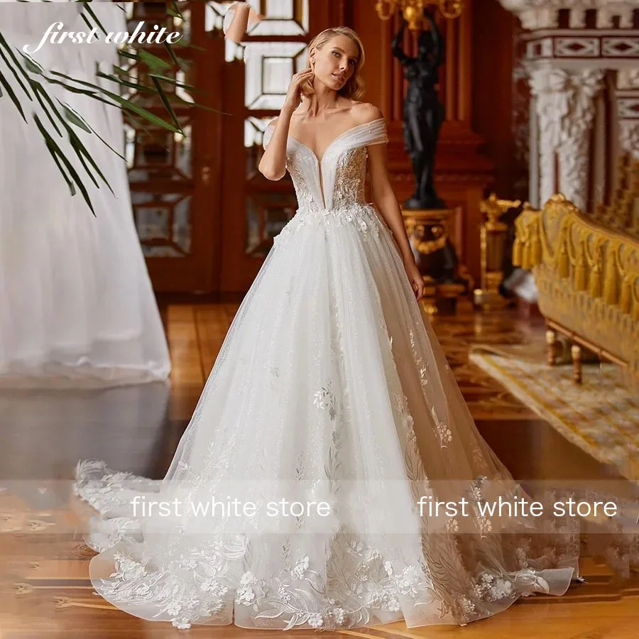 Eerste witte op maat gemaakte trouwjurk charmant uit de schouder kralen applicaties bruids v-hals backless prinses vestidos de novia