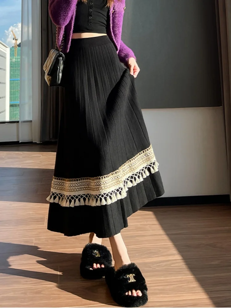 SMTHMA المرأة 2025 الخريف/الشتاء لينة عالية الخصر ألف خط كبير سوينغ تنورة مع مائة أضعاف شرابة الربط محبوك تنورة طويلة #1