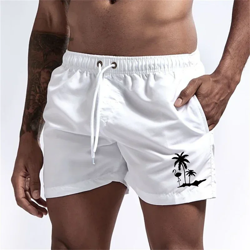 Pantalones cortos avec imprimé árbol de coco et flamenco para hombre, pantalons cortos de playa informales de verano, bañado