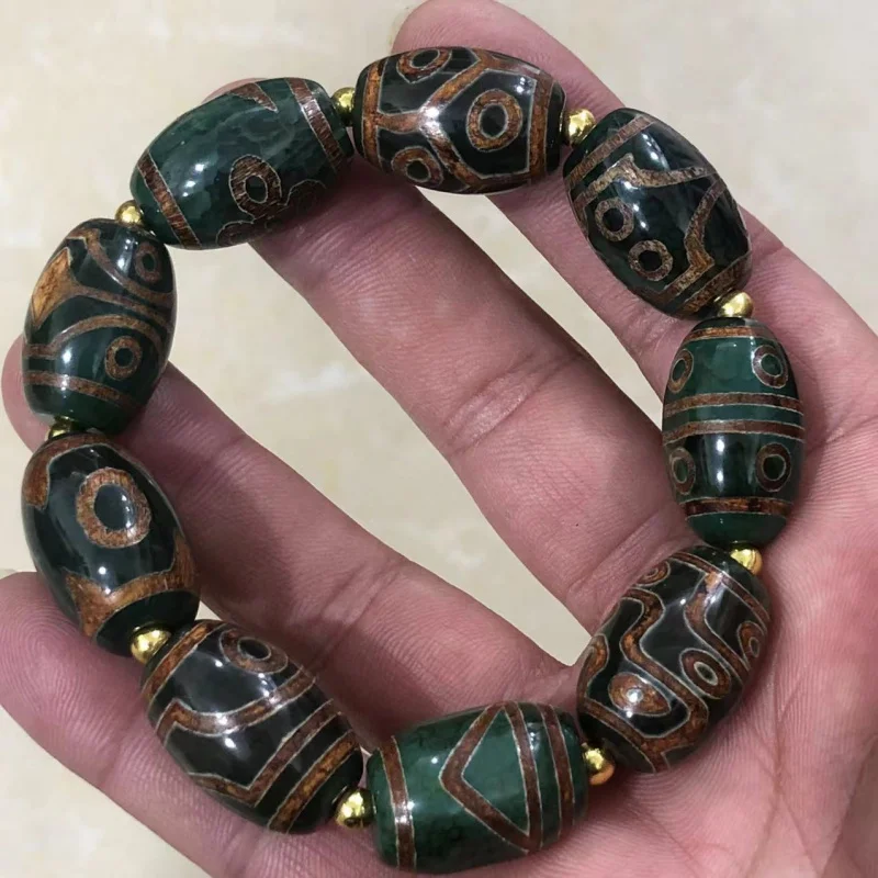 

Manufacturer Wholesale Tibetan Old Agate At a Glance----Nine-Eyed Dzi Bead Barrel Bead Loose Bead BraceletDIYOrnament