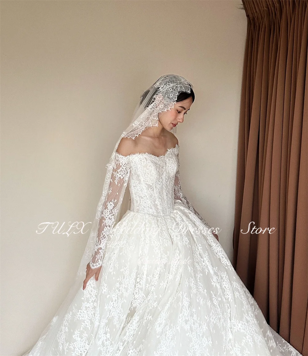 ชุดแต่งงานลูกไม้สีงาช้างหรูหรา TULX สไตล์เกาหลี ถ่ายรูป ชุดเจ้าสาวแขนยาวเปิดไหล่ คอร์เซ็ทสั่งตัดได้ 웨딩드레스