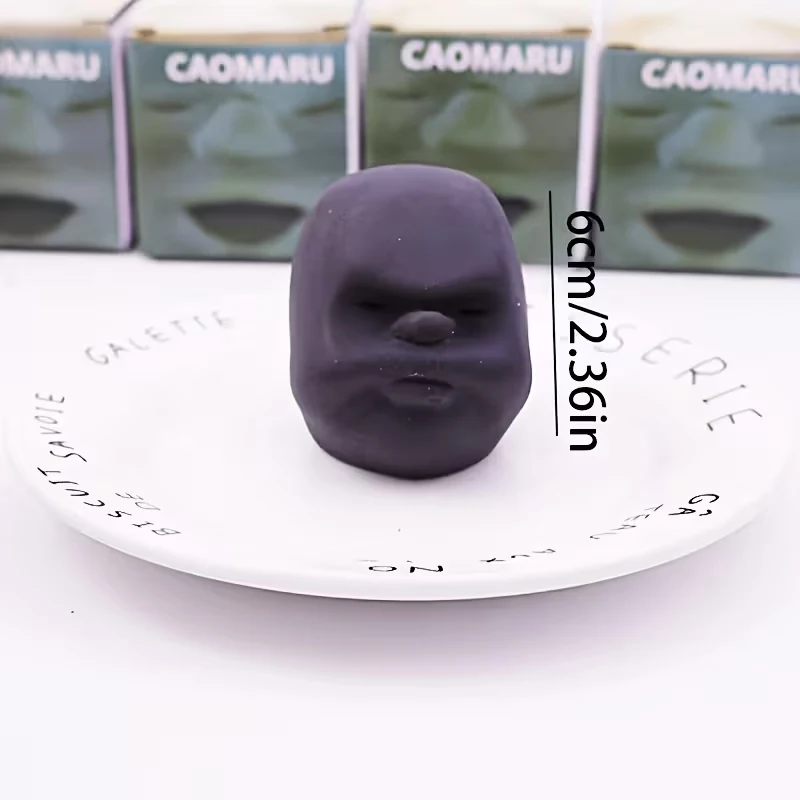 Quirky-faced stress-relief squeeze toy for the office—a fun, squishy ball with a funny expression to help you blow off steam.