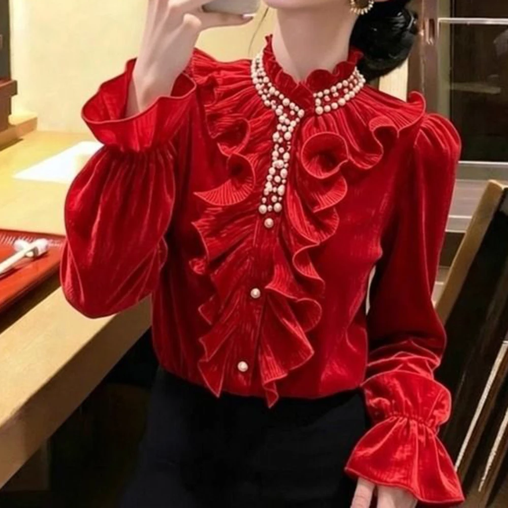 

Natal year red ruffle edge shirt women's 2026 spring design sense unique beautiful temperament high-end French top