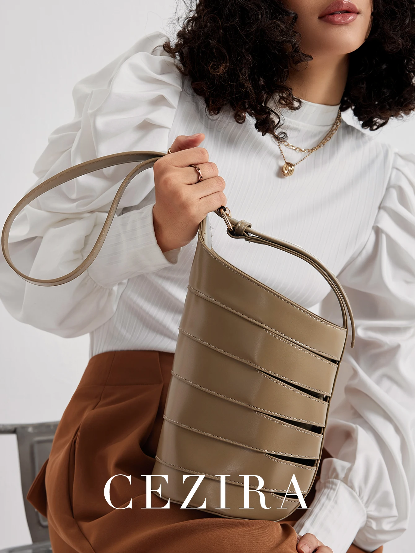 

CEZIRA Fashion PU Vegan Leather Shoulder Bag Women Wide Strap Drawstring Liner Luxury Fish bone Shaped Bucket Handbag Hollow Out