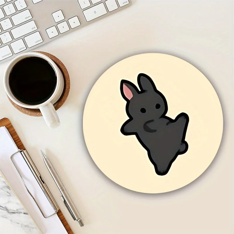 

The cute grey rabbit round mouse pad and anti-slip rubber base desk mat are suitable for home and office computer accessories