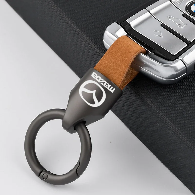

Genuine Leather Car Key Holder Pendant Emblem Keychain for Mazda CX-30 CX-50 Mazda 3 Car Interior Decoration