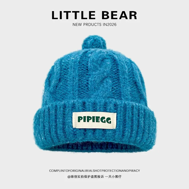 Y2K Solid Blue Cable Knit Beanies for Women Mini Pom Pom and Label Design Soft Fuzzy Stretchy Adult Streetwear Winter Hats
