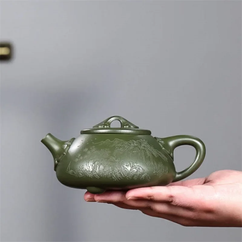 

Yixing original mine green clay handmade carved purple clay teapot Landscape Ruyi Stone Ladle Purple Sand Pot Chinese teapot