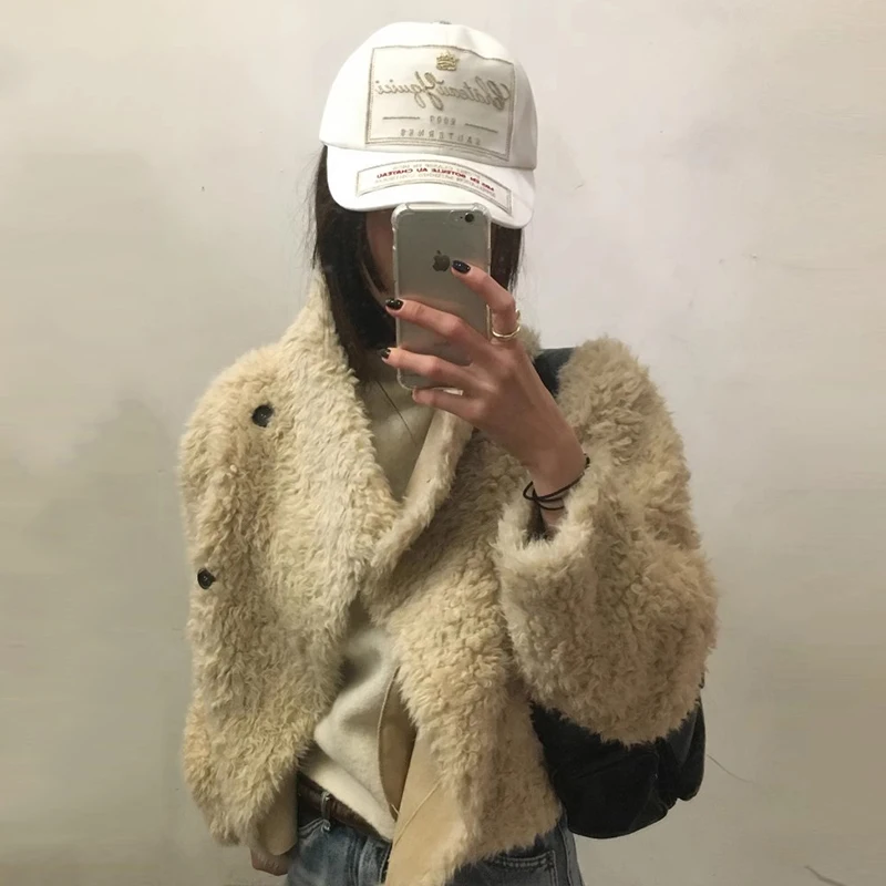 シックな秋冬ヴィンテージ両面着用ラムファーレザージャケットスタンドカラー長袖女性のショートコート韓国スタイル