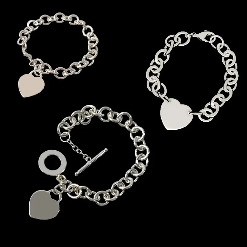 Silver Thick Chain Paired with Exquisite Heart-shaped Pendant Bracelet, Making Your Outfit Even More Outstanding.