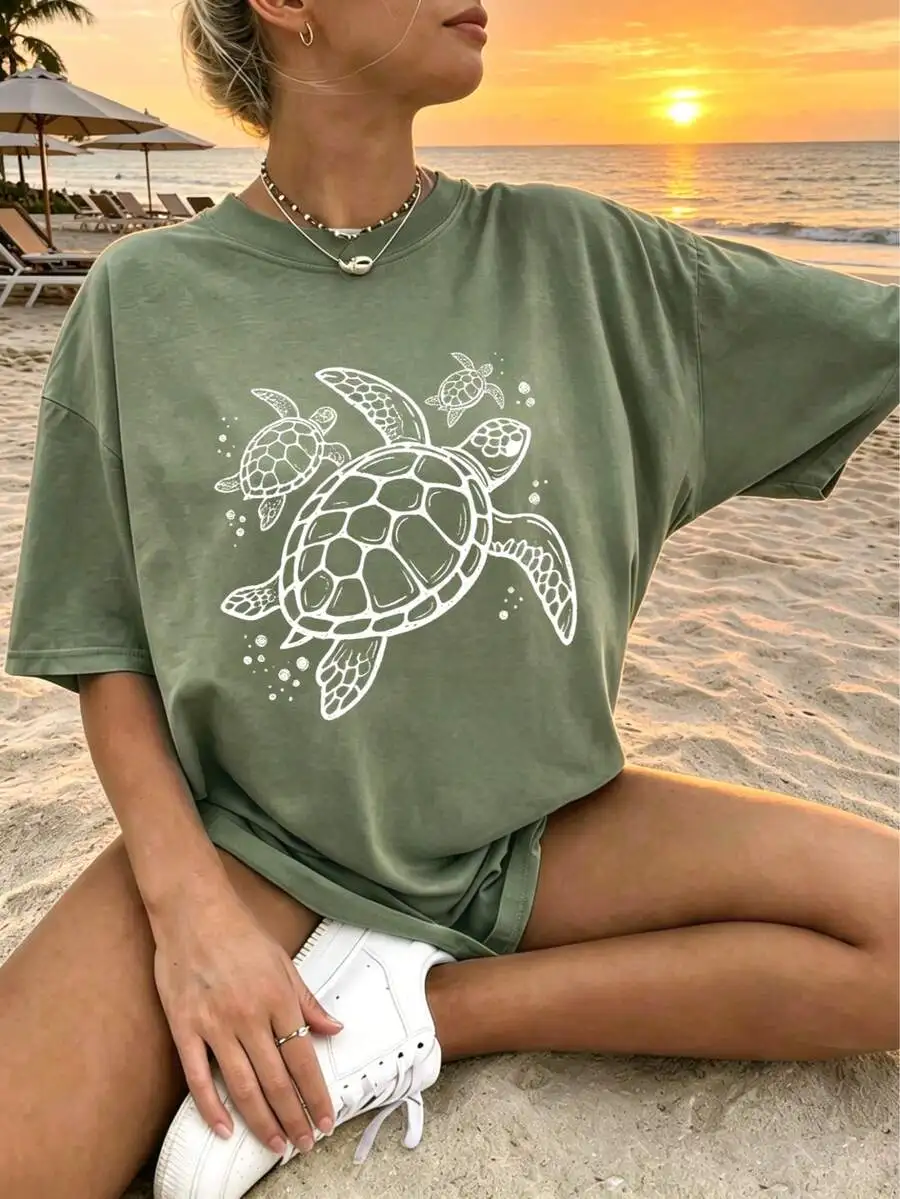 2026 New Fashion Women Ocean Style Graphic T Shirt Swimming Turtle Print Loose Short Sleeve Summer Beach Vacation Comfortable Round Neck Basic Top T Shirt