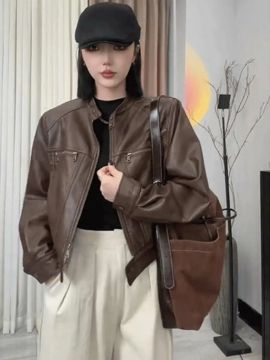 

Дизайнерская укороченная куртка из искусственной кожи для женщин: свободный крой, эффект стройности, байкерский стиль, модный компактный размер, для повседневной носки, ветрозащитная.