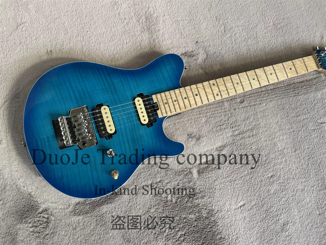 

Blue Electric Guitar Man body Squilted maple Top Bird's eye Fretboard And neck Tremolo bridge Zebra pickup support customization