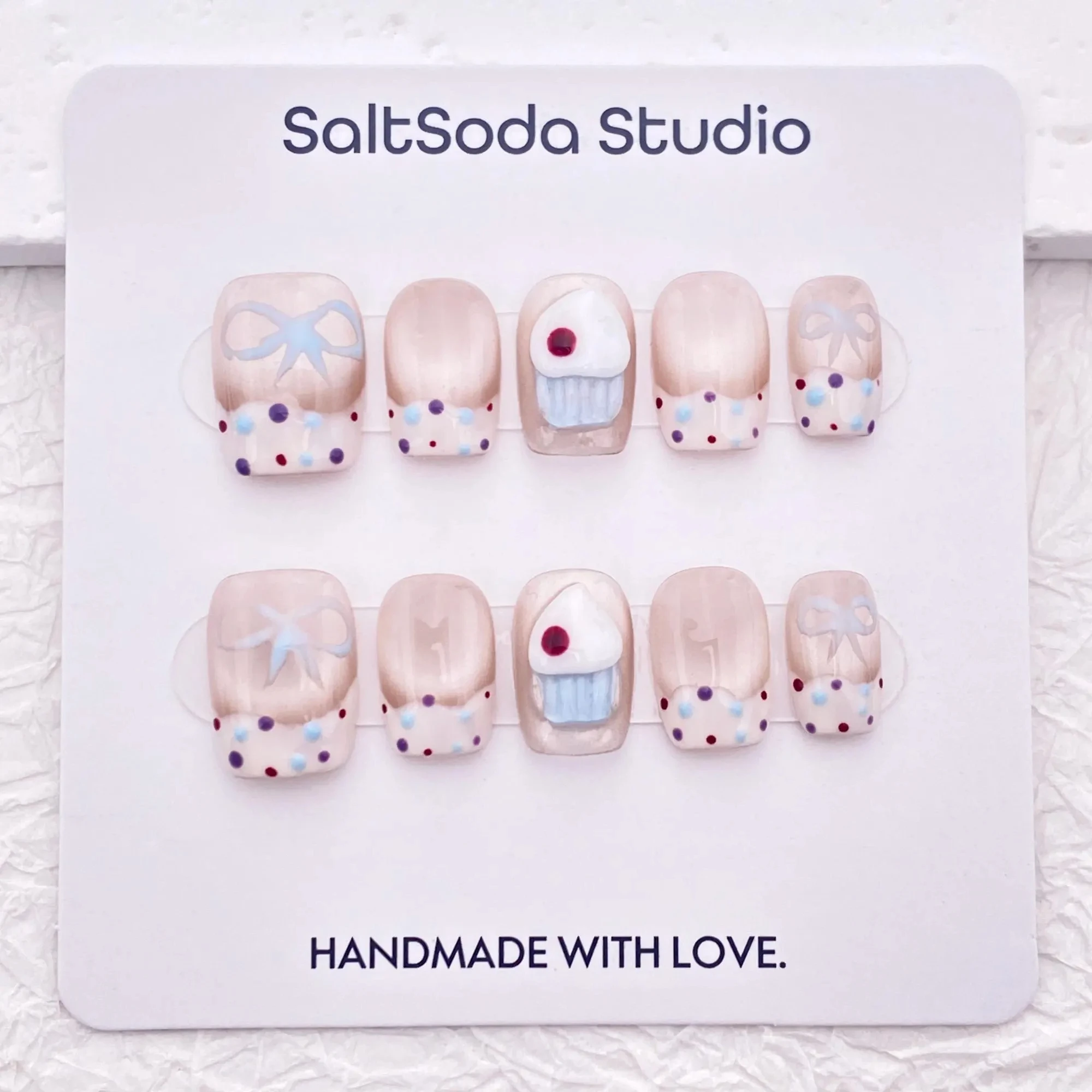 

Cute colorful polka dot bow cream cake nail art, French hand-painted sweet cat eye nail art, high-quality reusable nail art