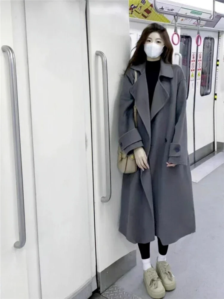 Cappotti di lana lunghi coreani di High Street Donna 2025 Tasche casual invernali Chic Trench caldo allentato Cappotti moda casual femminile