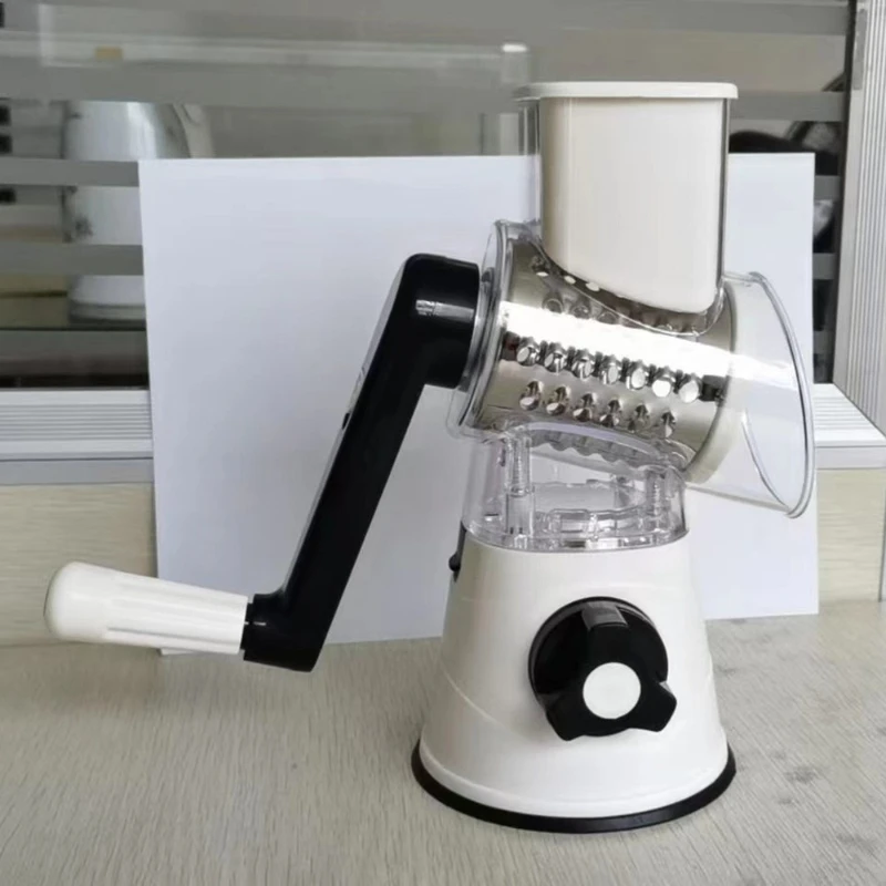 

Hand crank drum type multi-function vegetable cutter Vegetable grinder Vegetable cutters Shredding and slicing Hand crank