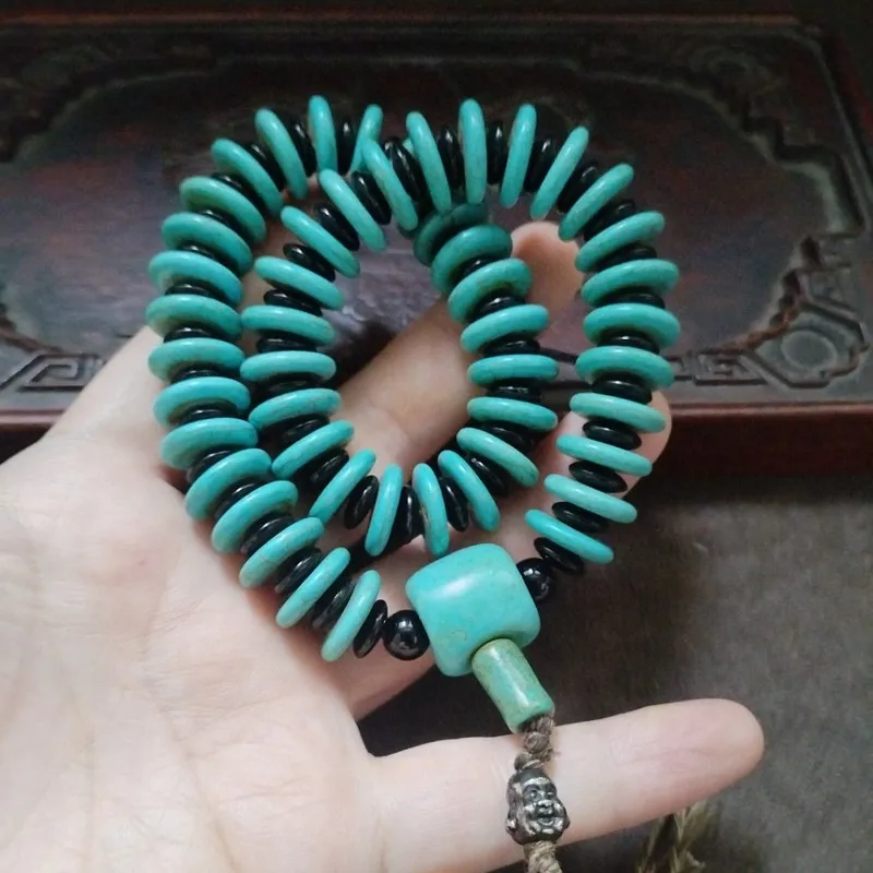 Antique collectible old patina round turquoise peace pendant bead handheld for display and enjoyment