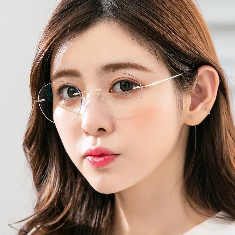 نظارات OLLYMURS خفيفة للغاية ومرنة من التيتانيوم النقي، نظارات طبية دائرية بدون إطار للرجال والنساء