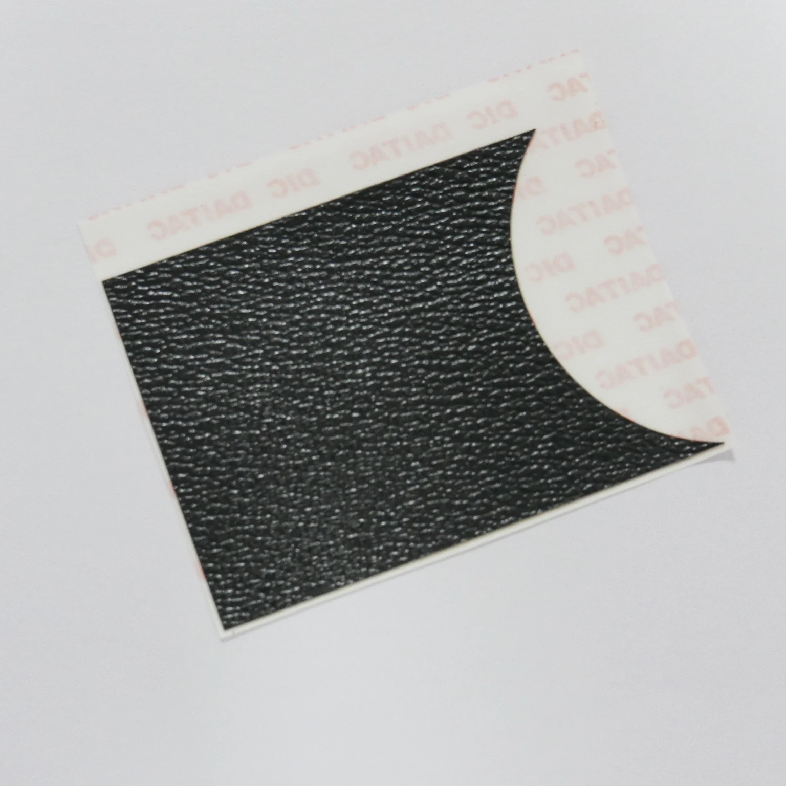 

Repair parts with black stickers on the front cover of the Fujifilm Fuji X100VI front shell