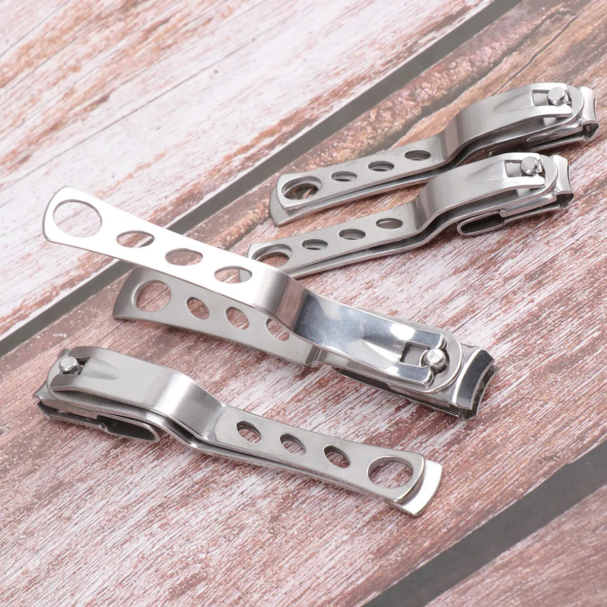 

Набор профессиональных кусачек для ногтей из нержавеющей стали, 4 шт., маникюрные ножницы-триммеры для искусственных ногтей, с удобной ручкой, для ежедневного ухода за ногтями