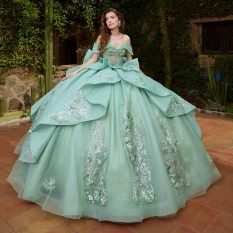 

Мятно-зеленое блестящее бальное платье для выпускного вечера с открытыми плечами, аппликациями из пайеток, цветочным декором, бисером, кристаллами, бантом и корсетом из тюля для вечеринки