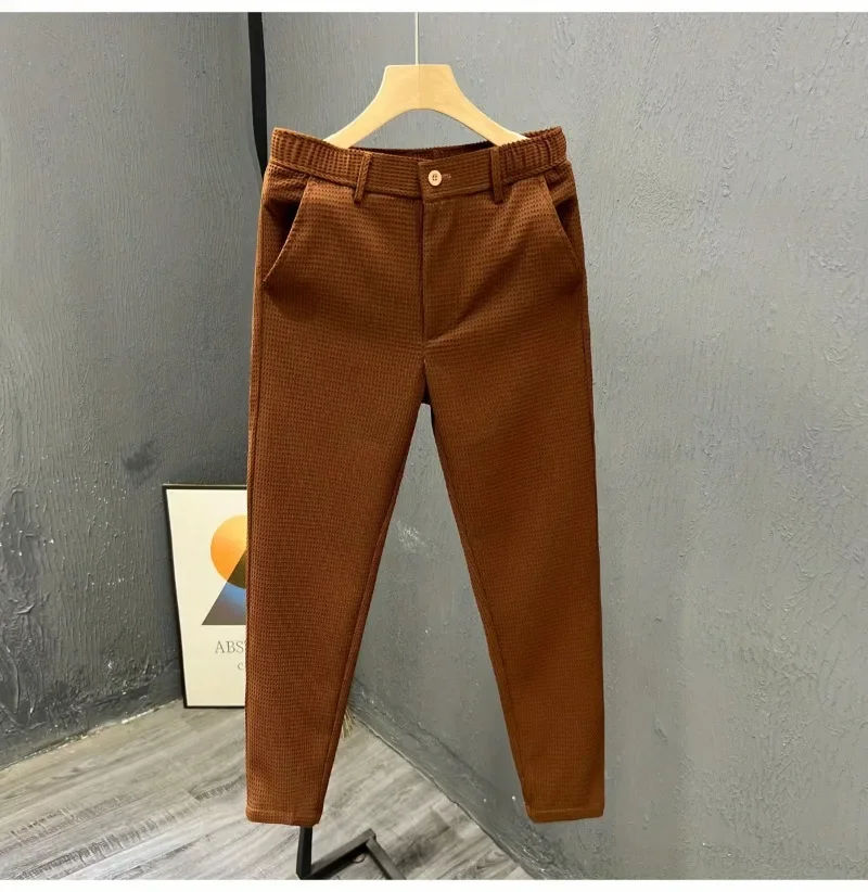 2025 Tendenza per il tempo libero Edizione coreana Estate Tinta unita Tasca con cerniera Vita alta da uomo Elastico Slim Fit Dritto Nove pantaloni divisi