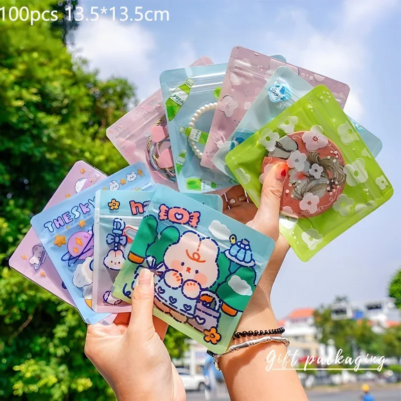 

100pcs Candy Food Cookies Storage Bags Cute Cartoon Self Sealing Bag Clear Fewelry Mask Packaging Packet DIY Snack Gift Bags