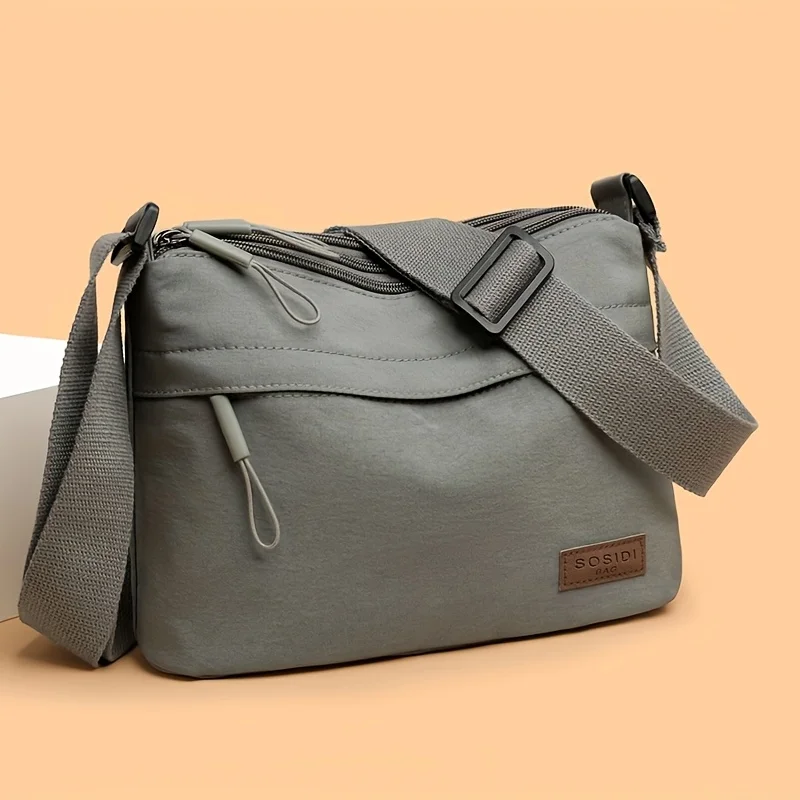 قطعة واحدة من حقيبة كروس ذات سعة كبيرة للنساء تتميز بتصميم متعدد السحاب ويمكن ضبط الأكتاف للسفر والعمل اليومي