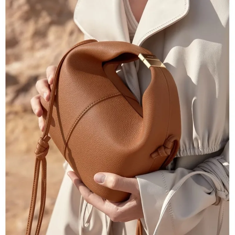 

2026Новая высококачественная нишевая многофункциональная сумка через плечо Bento во французском стиле, повседневная женская сумка из воловьей кожи