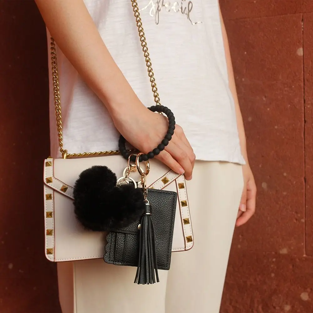 อุปกรณ์เสริมซิลิโคนพวงกุญแจทนทานล้างทำความสะอาดได้สร้อยข้อมือที่ใส่พวงกุญแจแฟชั่น