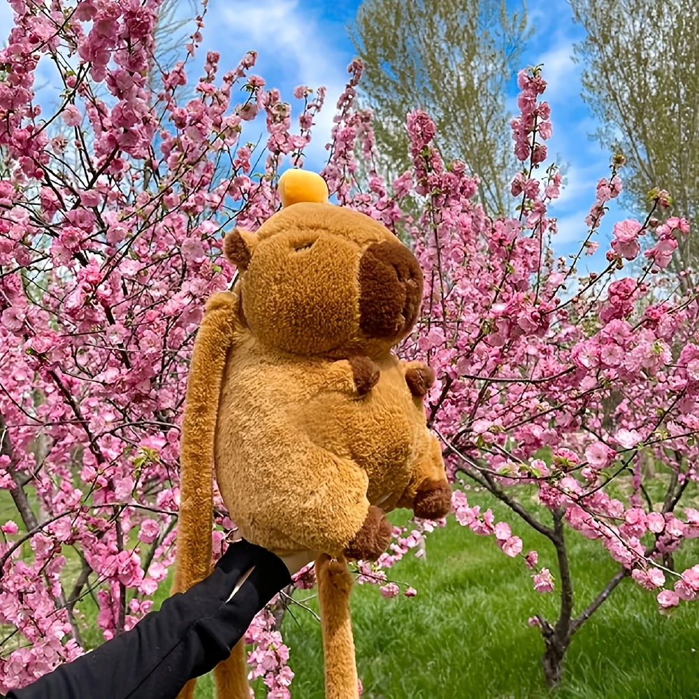 Capibara pluche rugzak met oranje pom-pom, knuffels, gevulde capibara, knuffels, goederen voor kinderen, cadeaus voor meisjes en jongens