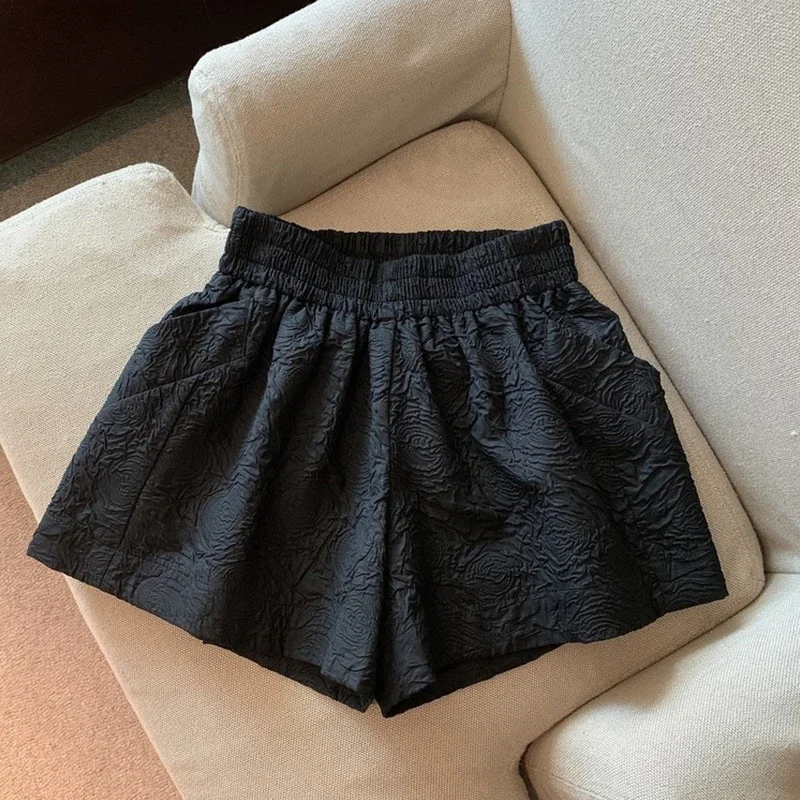 Pantalones cortos de Jacquard blanco y negro para mujer, pantalones cortos de pierna ancha con bolsillos elásticos de cintura alta, ropa informal suelta, medio pantalón, verano 2025