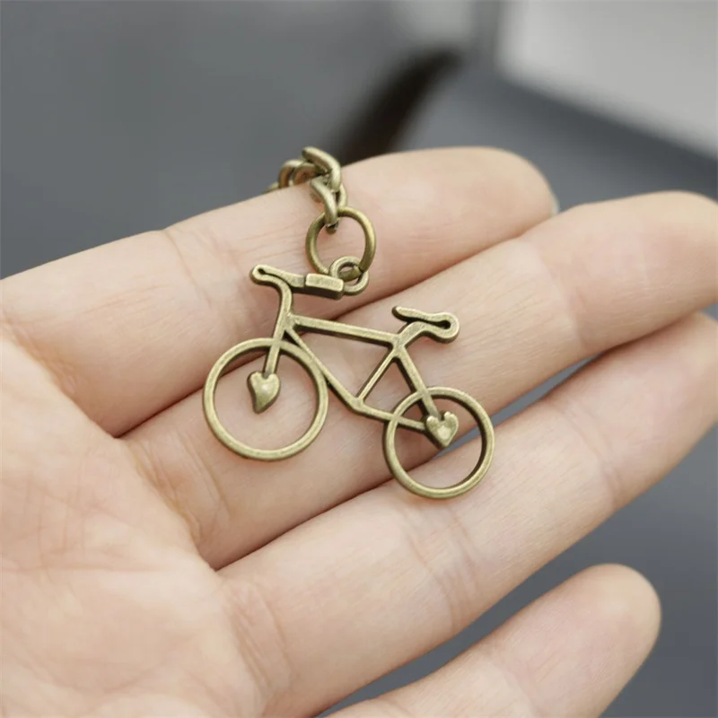 خمر سبيكة دراجة مفتاح سلسلة الرجال ريترو مجوهرات بسيطة الدراجة حلقة رئيسية حقيبة يد على ظهره قلادة
