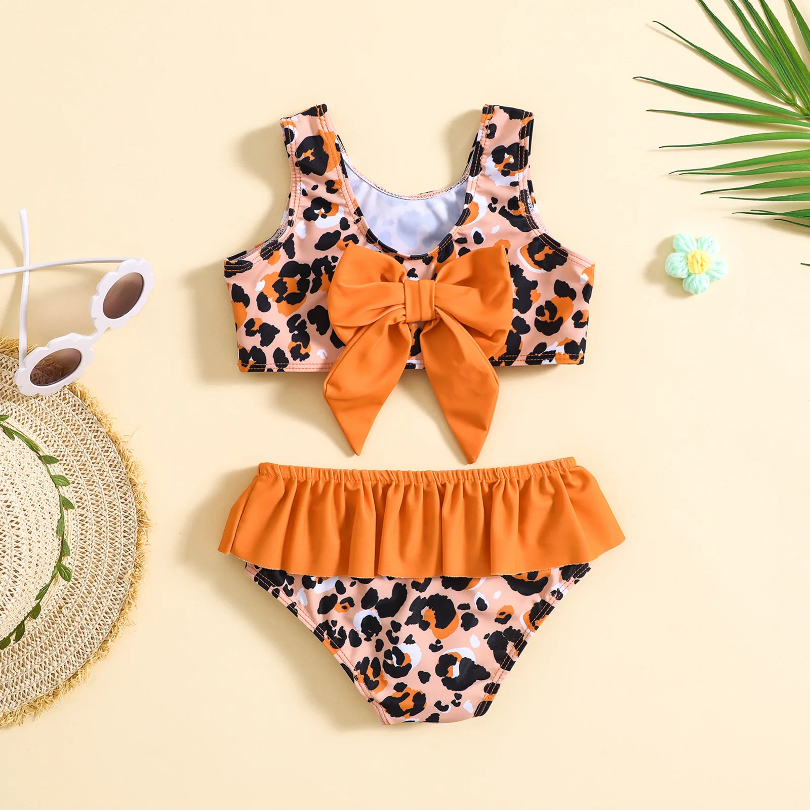 Baby two piece swimsuit with leopard print and big bow,skirted bottom,suitable for seaside and pool play