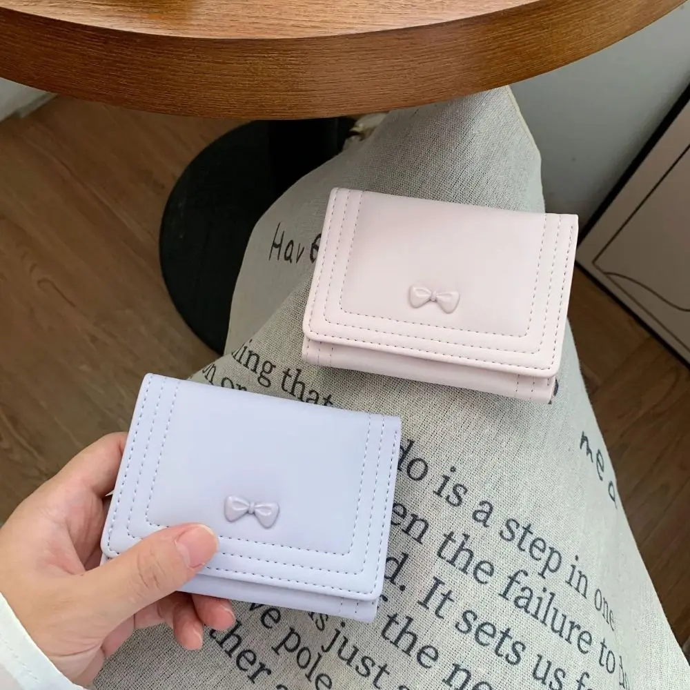 Portafoglio corto con fiocco alla moda Portamonete in pelle tinta unita in pelle PU Mini porta carte d'identità di grande capacità per donna