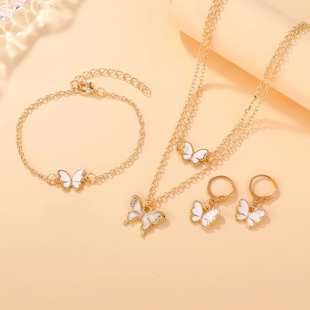 طقم مجوهرات على شكل فراشة متعددة الألوان مكون من 4 قطع - قلادة من المينا الذهبية اللون وأقراط وسوار وإكسسوار للحفلات اليومية طراز Y2K