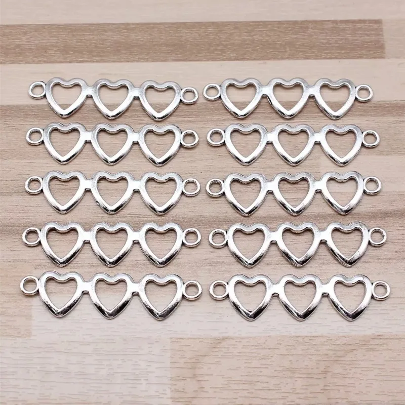 150 Stück antiksilberfarbene Herzverbinder 43 x 11 mm für DIY-Schlüsselanhänger, Halsketten, Armbänder, Schmuckherstellung im Großhandel – Detail 1