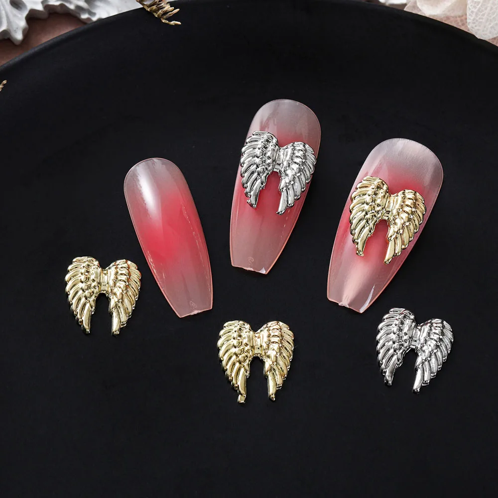 20 Stück Engelsflügel Metall Nail Art Charms Gold Silber Flügel Nageldekoration für Maniküre DIY 3D Strass glitzernde Nagelteile