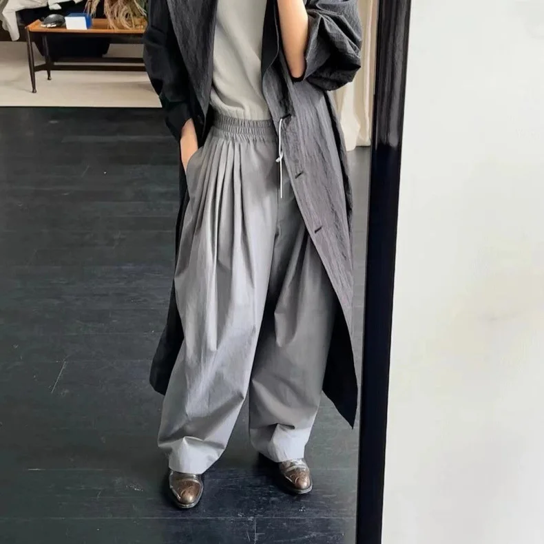 

Весна 2026: Женские повседневные хлопковые брюки-морковки Dongdaemun Mondal с эластичным поясом и плиссировкой, средней/заниженной талией