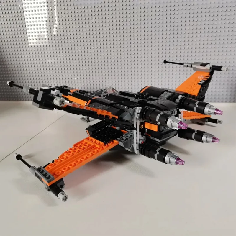 717 ชิ้น สินค้าใหม่ในสต็อก ชุดตัวต่อโมเดลยานอวกาศ X-wing Fighter ของโป สงครามอวกาศ ของเล่นตัวต่อประกอบเอง ของขวัญสำหรับเด็กผู้ชายและผู้ใหญ่