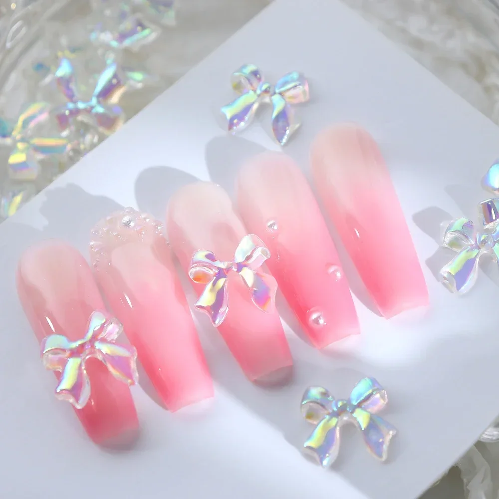 Breloques transparentes pour nail art, ruban Aurora, nœud 3D, Kawaii brillant, accessoires de manucure d'été, fournitures de décoration, N64.30 pièces