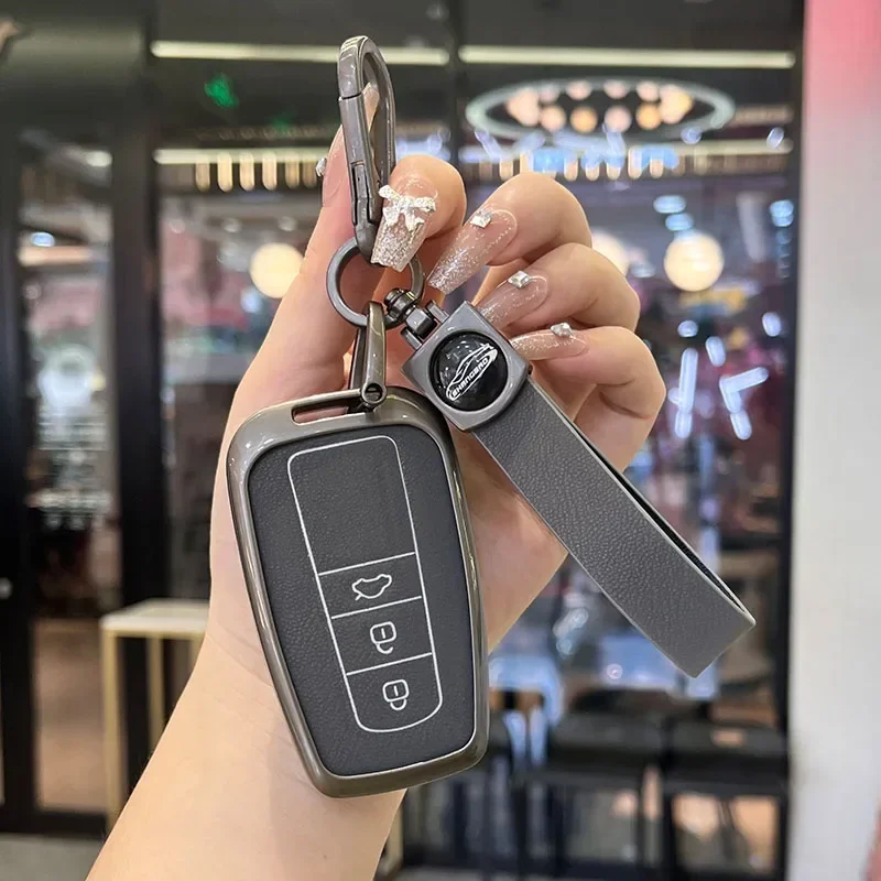 حافظة مفاتيح السيارة من سبائك الزنك + الجلود لسيارة تويوتا كورولا هايبرد 2021 Rav4 لاند كروزر برادو كامري هايلاندر بريوس C-HR 2018+